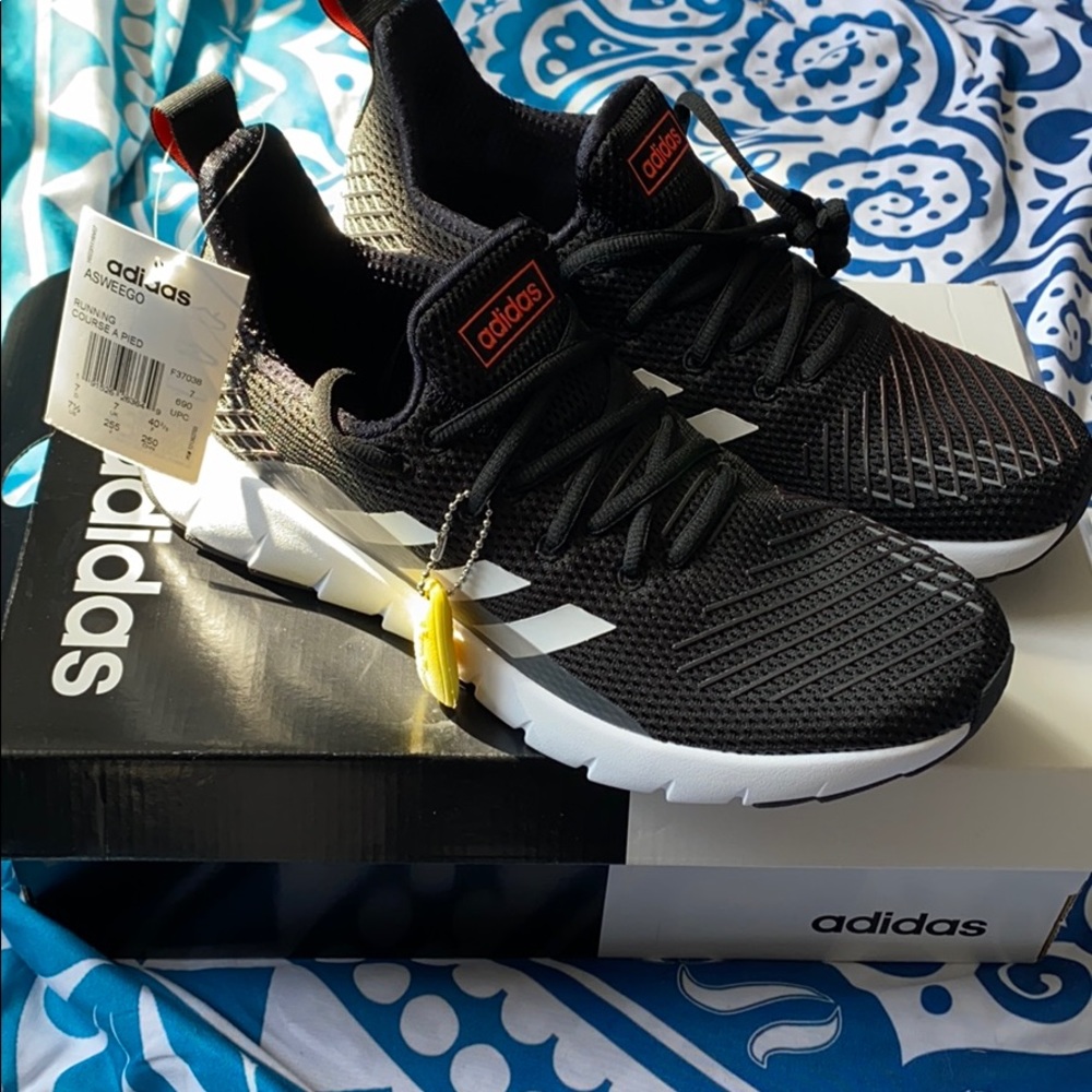 Brand new Adidas size 7.5